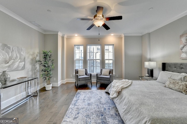 606 Broadview Ter NE, Atlanta, GA 30324 - bedroom featuring ceiling fan, baseboards, wood finished floors, visible vents, and ornamental molding