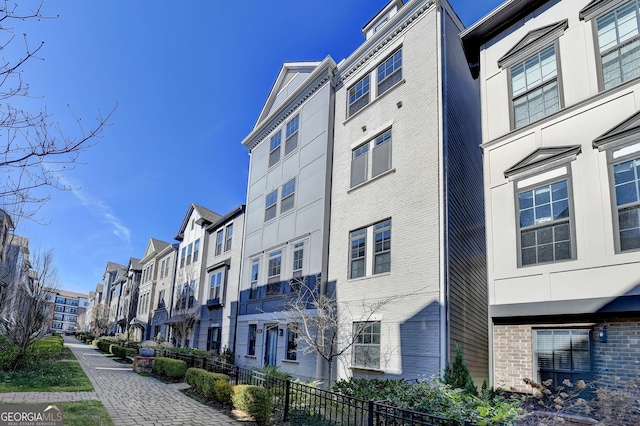 606 Broadview Ter NE, Atlanta, GA 30324 - view of building exterior with fence and a residential view