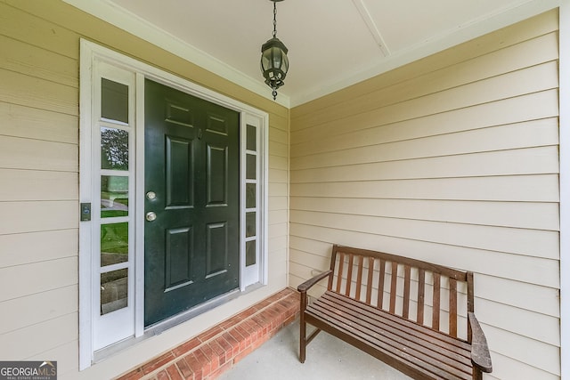entrance to property with covered porch