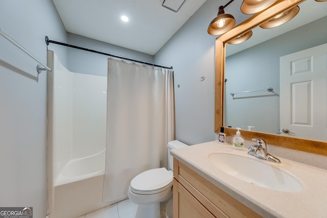 bathroom featuring vanity, shower / tub combo with curtain, tile patterned floors, and toilet