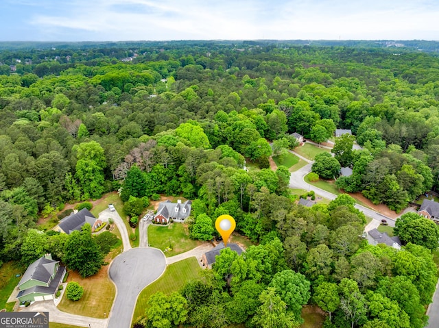 bird's eye view with a view of trees