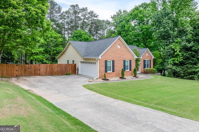 view of front facade featuring fence, an attached garage, a shingled roof, a front lawn, and brick siding