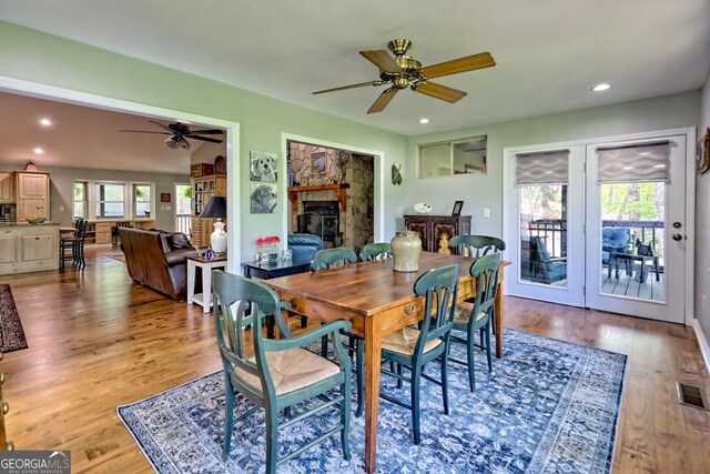 dining room featuring visible vents, a ceiling fan, recessed lighting, and light wood-type flooring