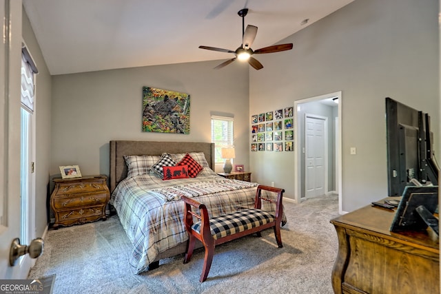 bedroom featuring baseboards, carpet flooring, ceiling fan, and high vaulted ceiling