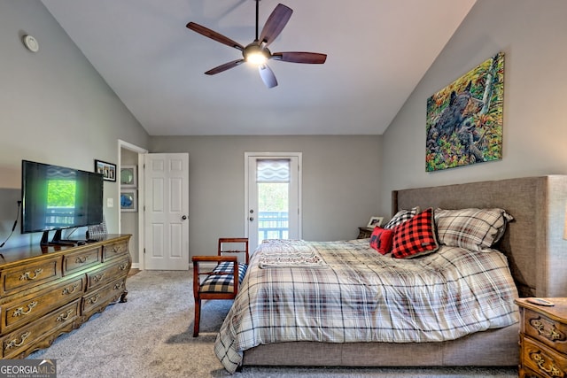 bedroom with a ceiling fan, carpet, and lofted ceiling