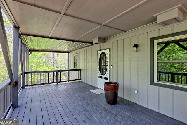 wooden deck featuring covered porch