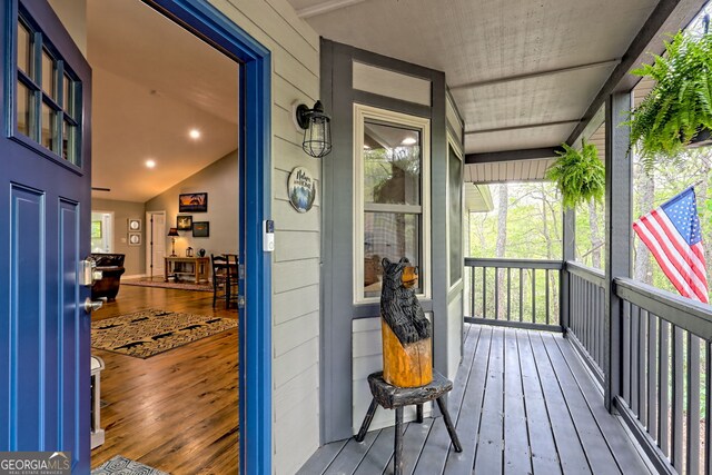 wooden deck featuring covered porch