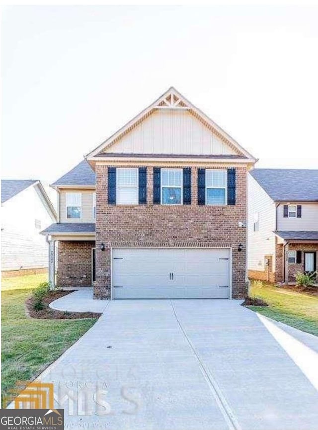 view of front facade featuring concrete driveway, brick siding, an attached garage, and board and batten siding