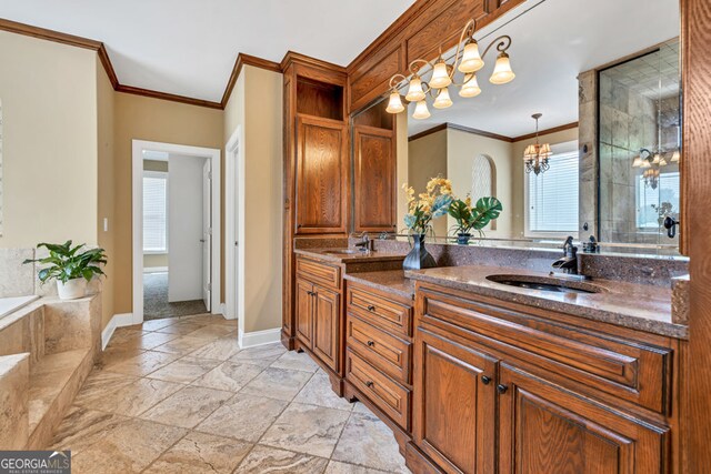 full bathroom featuring a sink, crown molding, a tile shower, and double vanity