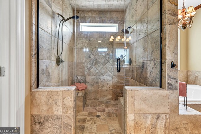 full bath with tiled shower