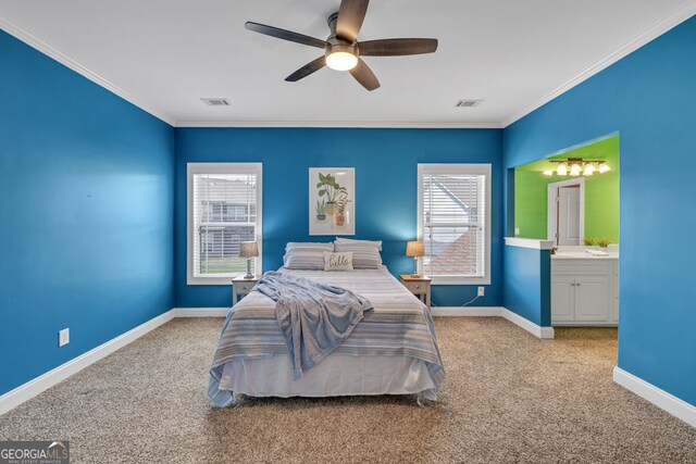 bedroom featuring ornamental molding, carpet, and visible vents