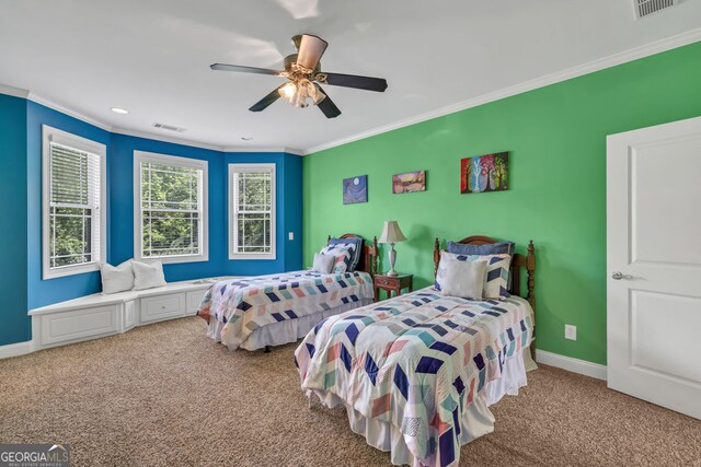bedroom with visible vents, crown molding, baseboards, and carpet floors