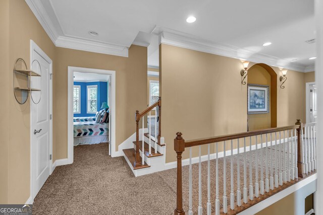 hall featuring baseboards, ornamental molding, carpet flooring, and recessed lighting