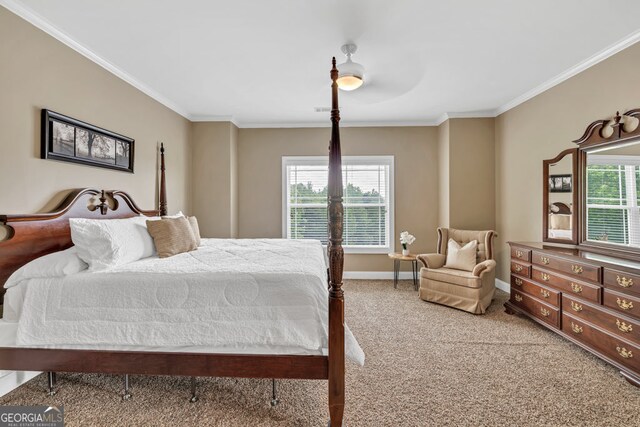 bedroom featuring baseboards, ornamental molding, carpet, and multiple windows