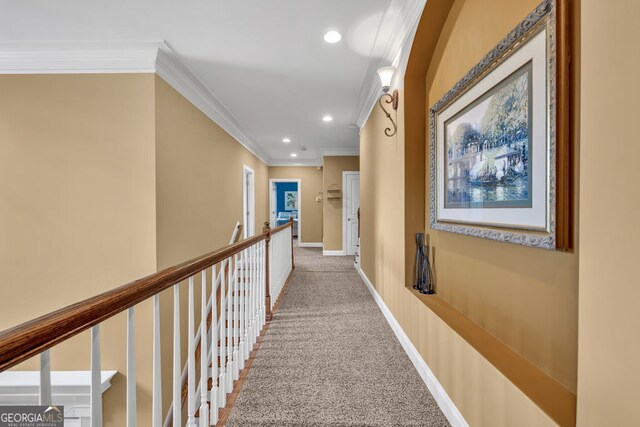 hallway featuring baseboards, ornamental molding, carpet flooring, and recessed lighting