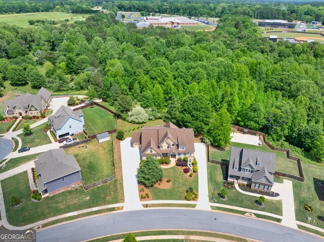 bird's eye view with a view of trees and a residential view