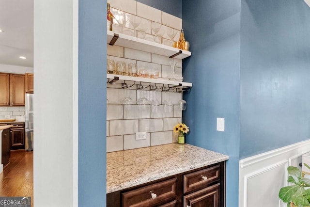 7730 Tiberon Pkwy, Cumming, GA 30028 - bar with recessed lighting, freestanding refrigerator, dark wood-type flooring, and tasteful backsplash