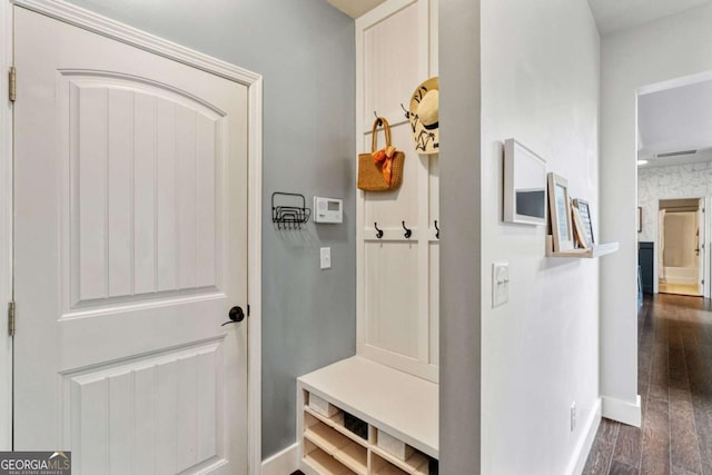 7730 Tiberon Pkwy, Cumming, GA 30028 - mudroom with baseboards and dark wood-style flooring