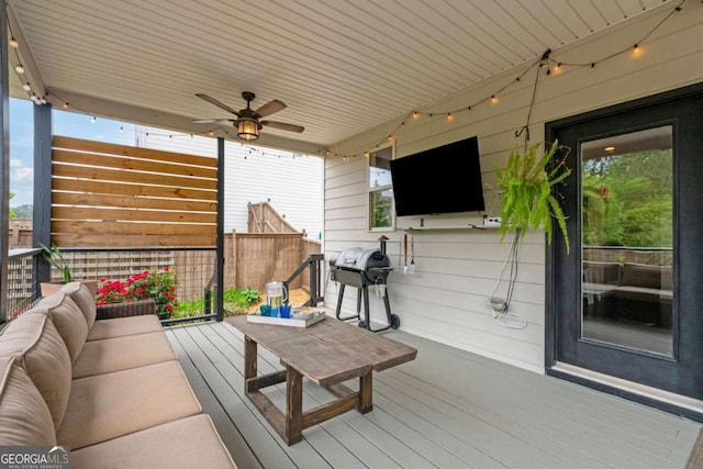 7730 Tiberon Pkwy, Cumming, GA 30028 - wooden deck featuring grilling area, an outdoor living space, and a ceiling fan