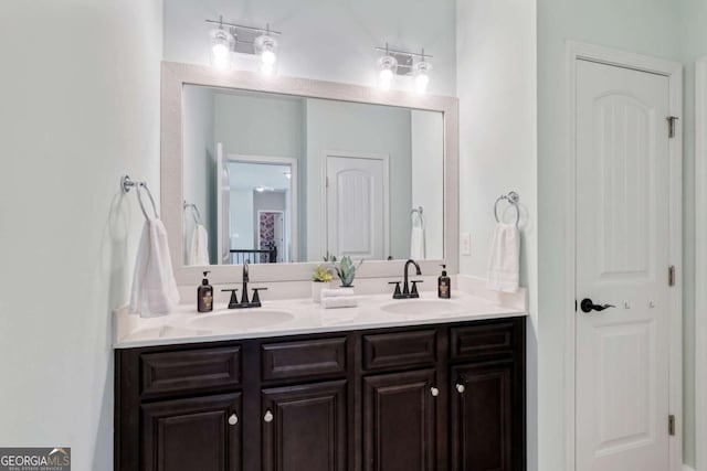 7730 Tiberon Pkwy, Cumming, GA 30028 - full bathroom with double vanity and a sink