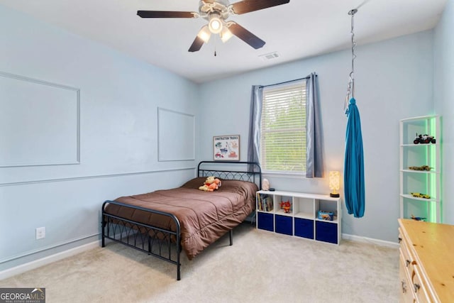 7730 Tiberon Pkwy, Cumming, GA 30028 - carpeted bedroom with baseboards, ceiling fan, and visible vents
