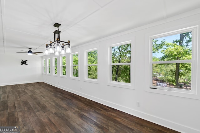 unfurnished sunroom featuring an inviting chandelier