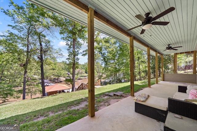 view of patio featuring ceiling fan