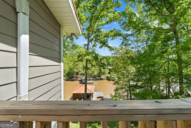 view of property exterior with a water view