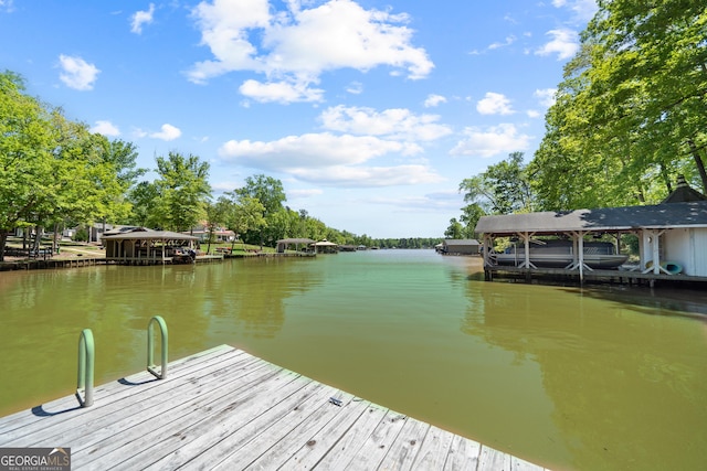 dock area with a water view