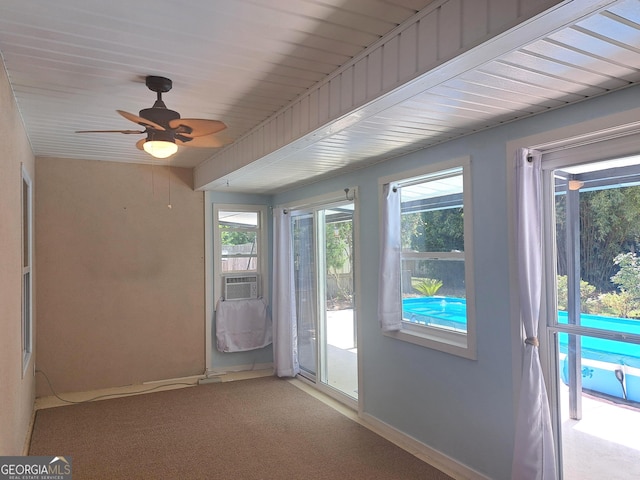 interior space with baseboards and a wealth of natural light