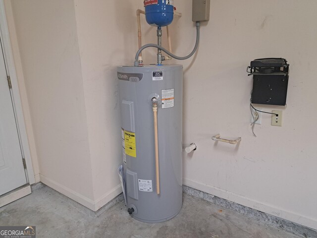 utility room with water heater