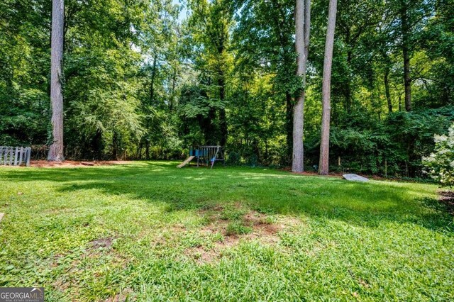 view of yard with a playground