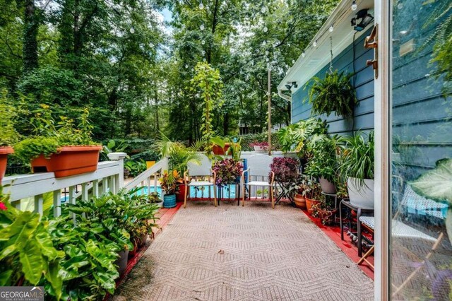 view of patio featuring a deck