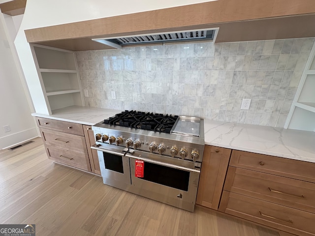 5753 Brendlynn Dr, Suwanee, GA 30024 - kitchen featuring double oven range, open shelves, light wood-type flooring, and tasteful backsplash