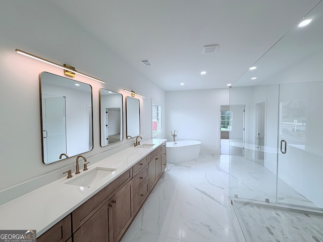 5753 Brendlynn Dr, Suwanee, GA 30024 - full bathroom featuring a soaking tub, marble tiled flooring, double vanity, a shower stall, and recessed lighting