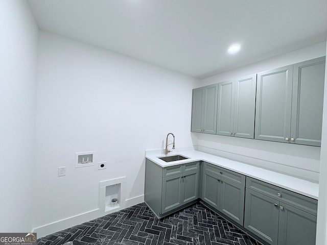 5753 Brendlynn Dr, Suwanee, GA 30024 - laundry area with electric dryer hookup, cabinet space, washer hookup, and recessed lighting