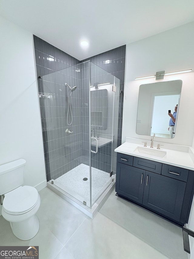 5753 Brendlynn Dr, Suwanee, GA 30024 - full bathroom featuring a stall shower, vanity, and tile patterned floors