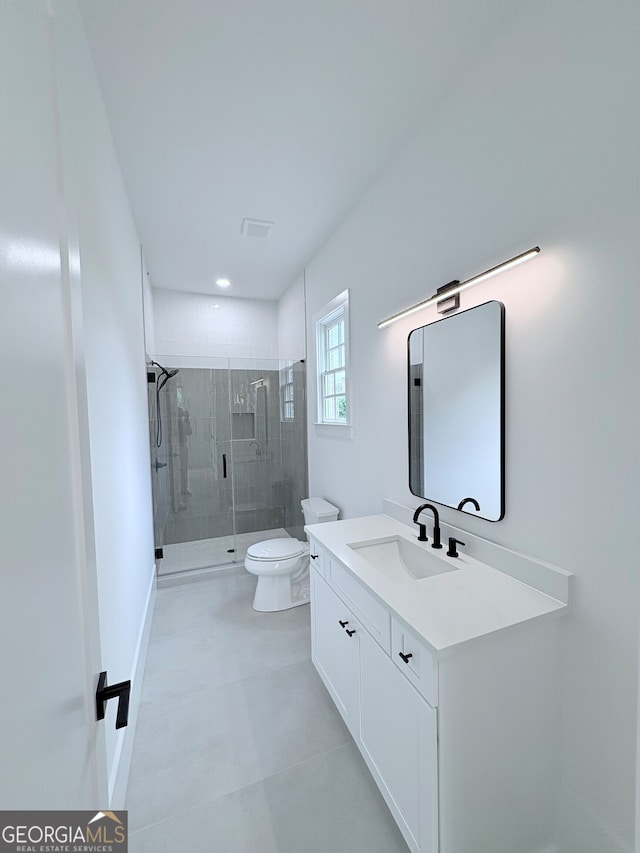 5753 Brendlynn Dr, Suwanee, GA 30024 - bathroom with vanity, a stall shower, and recessed lighting