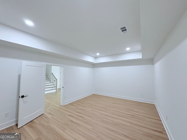 5753 Brendlynn Dr, Suwanee, GA 30024 - finished basement with light wood-style flooring, stairway, and recessed lighting