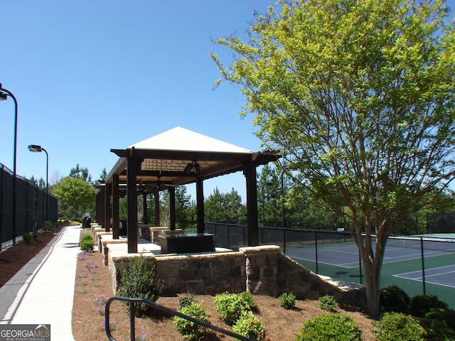5753 Brendlynn Dr, Suwanee, GA 30024 - view of home's community featuring a gazebo and a tennis court