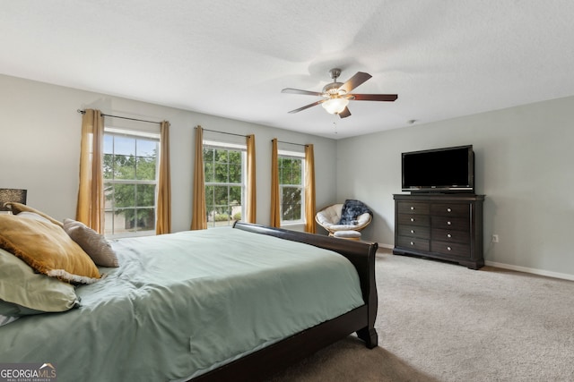 224 Pine Bluff Dr, Kingsland, GA 31548 - bedroom featuring carpet flooring, baseboards, and ceiling fan