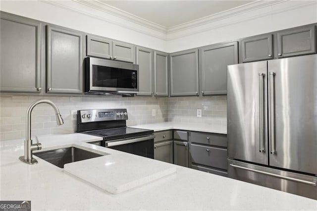5559 Glenridge Dr Unit 1103, Sandy Springs, GA 30342 - kitchen with ornamental molding, dark wood-type flooring, a sink, gray cabinetry, and stainless steel appliances