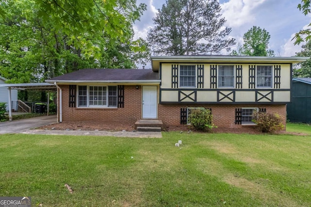 8431 Magnolia Dr, Jonesboro, GA 30238 - split level home featuring a front yard, brick siding, aphalt driveway, and a carport
