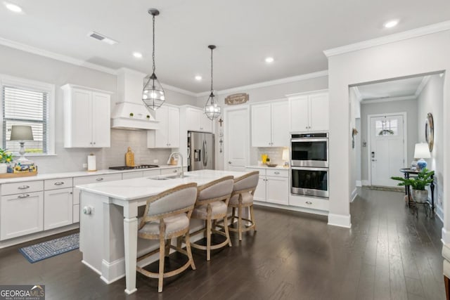 4207 N Carver Dr, Atlanta, GA 30360 - kitchen featuring visible vents, light countertops, tasteful backsplash, a sink, and appliances with stainless steel finishes