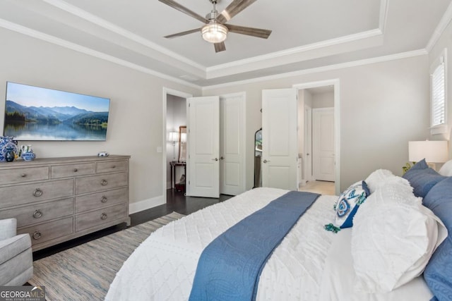 4207 N Carver Dr, Atlanta, GA 30360 - bedroom featuring a raised ceiling, wood finished floors, a ceiling fan, and ornamental molding