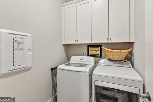 4207 N Carver Dr, Atlanta, GA 30360 - washroom featuring cabinet space and washing machine and dryer