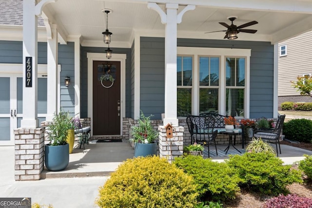 4207 N Carver Dr, Atlanta, GA 30360 - view of exterior entry with ceiling fan, a porch, and stone siding