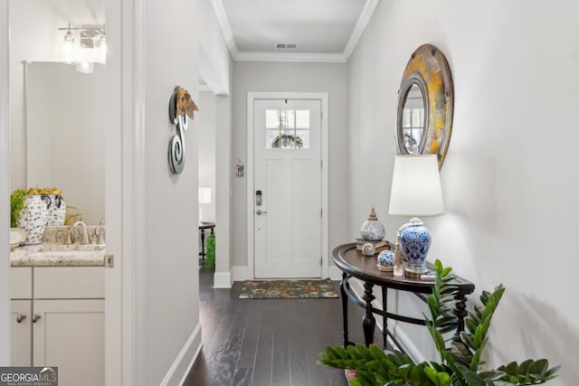 4207 N Carver Dr, Atlanta, GA 30360 - interior space featuring crown molding, baseboards, dark wood-style floors, and visible vents