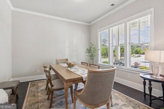 4207 N Carver Dr, Atlanta, GA 30360 - dining area featuring dark wood-type flooring and crown molding