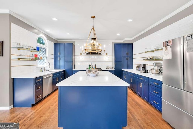 902 Preserve Bluff Dr, Buford, GA 30518 - kitchen with open shelves, appliances with stainless steel finishes, ornamental molding, and blue cabinets